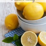 Bowl with Lemons on a wooden background